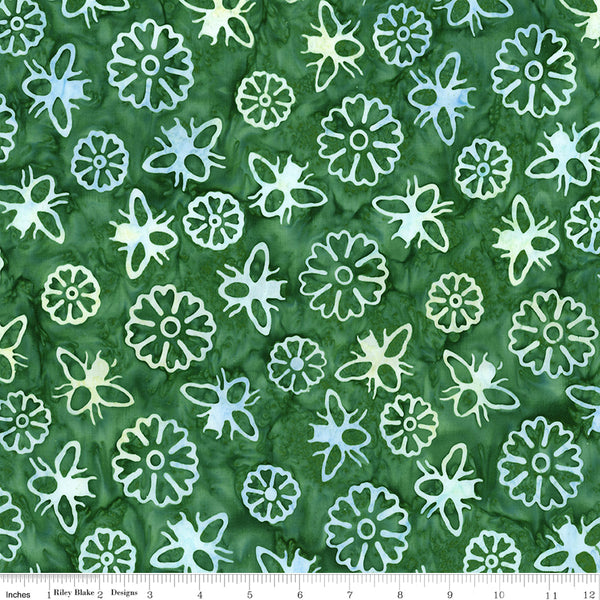 Patterned fabric with white flowers and leaves on a green background