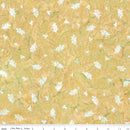 Fabric with white floral pattern on a butterscotch background