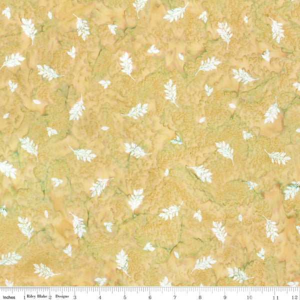 Fabric with white floral pattern on a butterscotch background