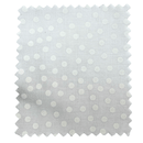 White fabric with small polka dots on a white background