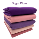 Stack of folded fabrics in purple, pink, and beige with 'Sugar Plum' text above.